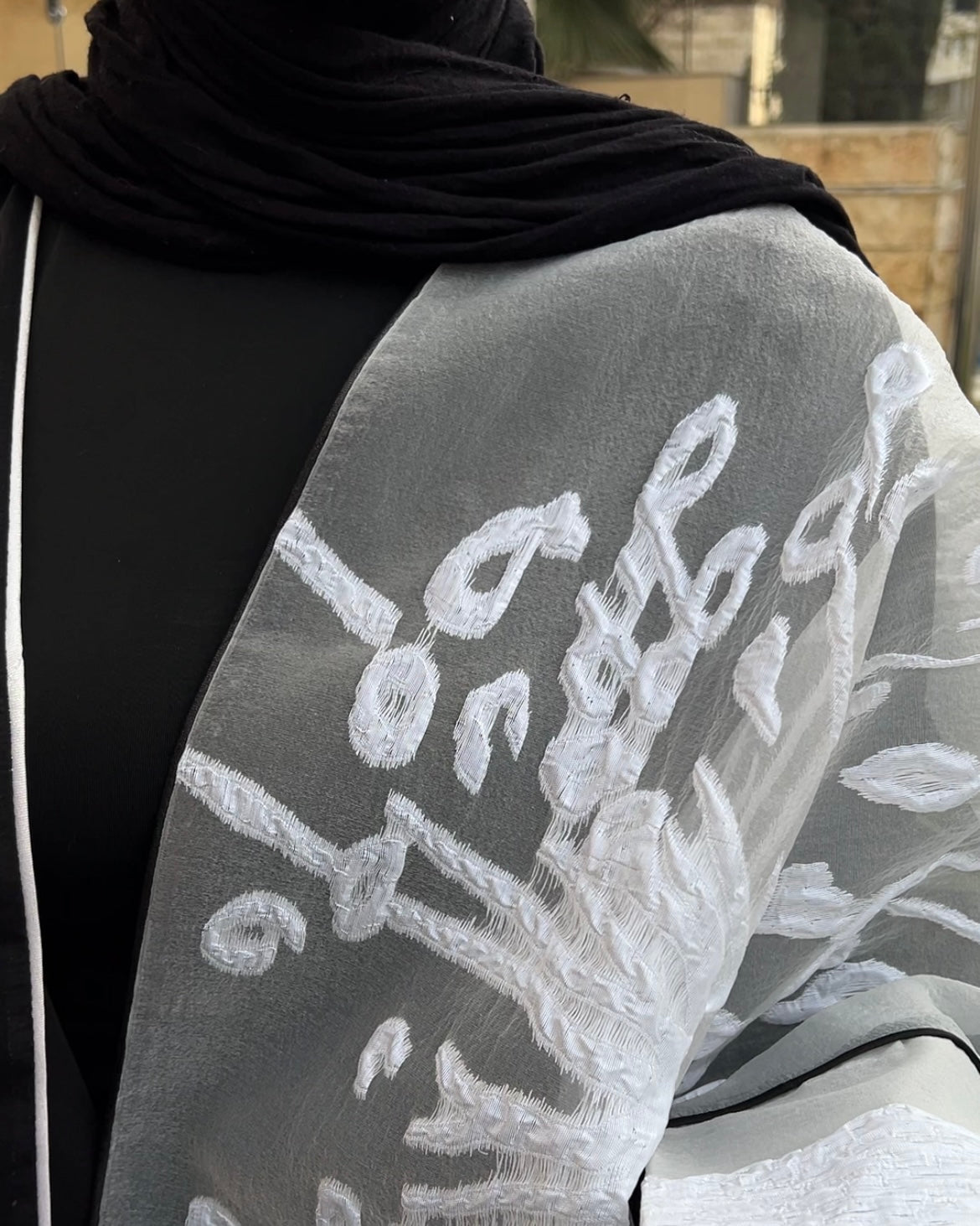 Luxurious Black Kaftan Embellished with White Embroidery | قفطان فخم باللون الأسود مزين بتطريز أبيض