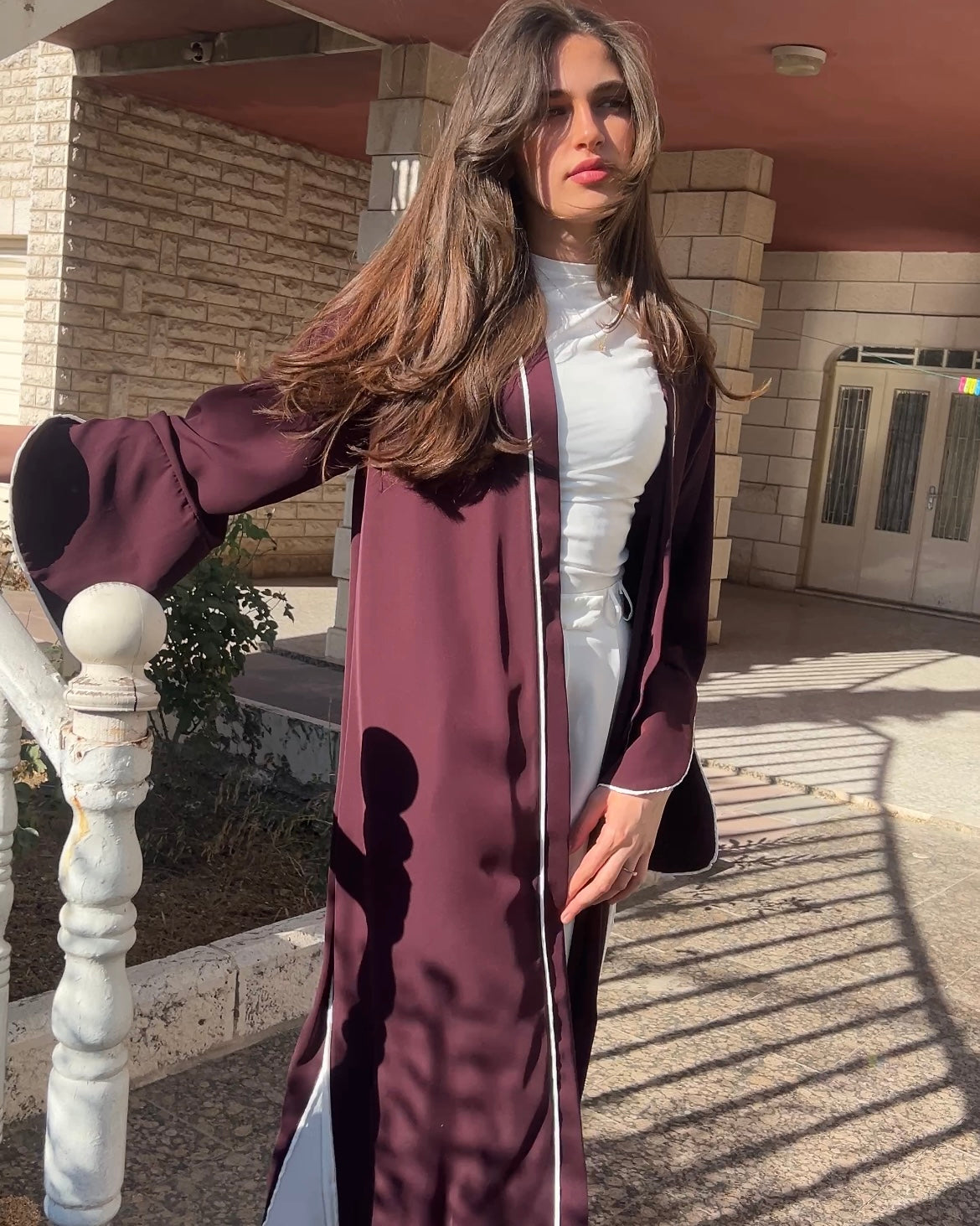 Elegant Maroon Abaya with Floral White Details | عباية أنيقة باللون الخمري مزينة بتفاصيل ورود بيضاء