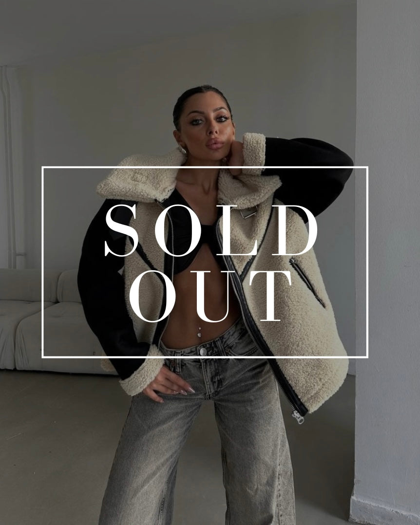 ז'קט פרווה עם שרוולי זמש