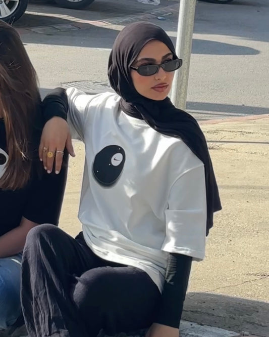 חולצת טי אוברסייז לבנה של נייקי