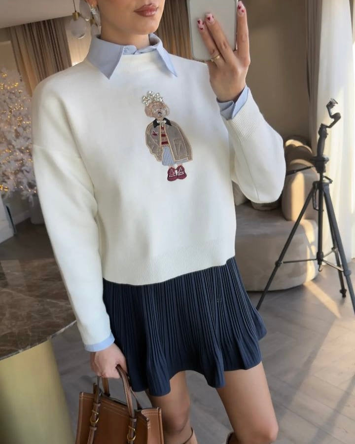 Ivory Knit Top with Embroidered Graphic Detail | بلوزة أوف وايت بتفصيل مطرز مميز