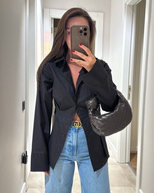 Black Tailored Button-Down Shirt with Sculpted Waist & Wide Cuffs | بلوزة بأزرار بتصميم منحوت وأكمام واسعة باللون الاسود