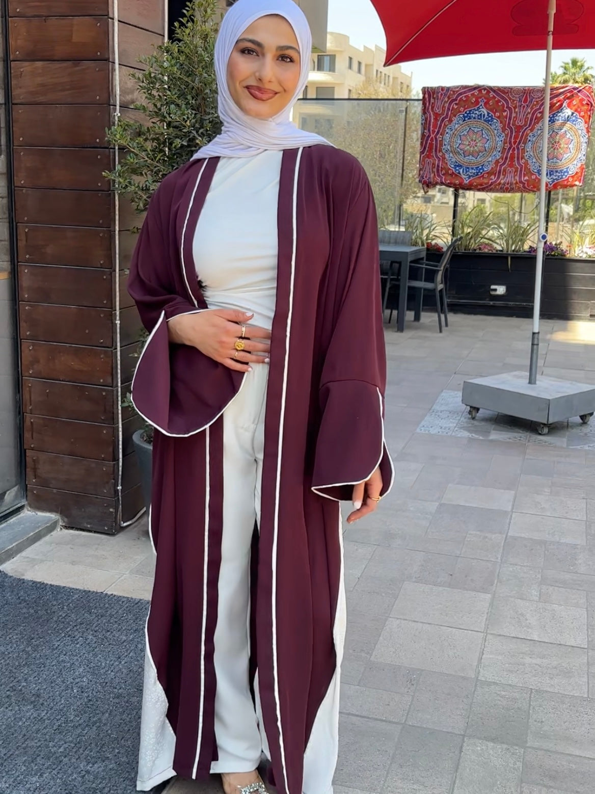 Elegant Maroon Abaya with Floral White Details | عباية أنيقة باللون الخمري مزينة بتفاصيل ورود بيضاء