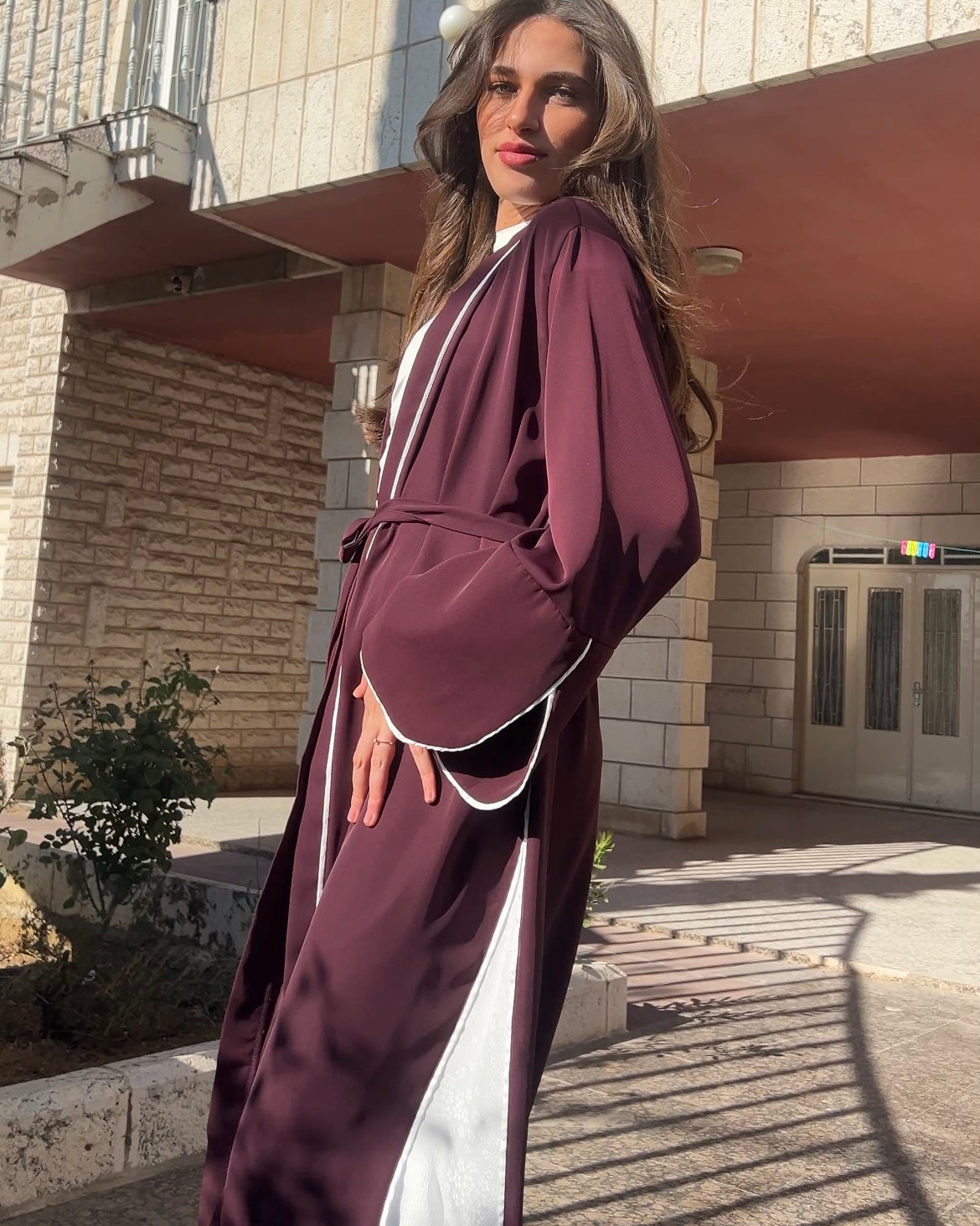 Elegant Maroon Abaya with Floral White Details | عباية أنيقة باللون الخمري مزينة بتفاصيل ورود بيضاء