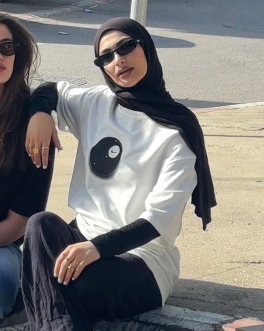 חולצת טי אוברסייז לבנה של נייקי