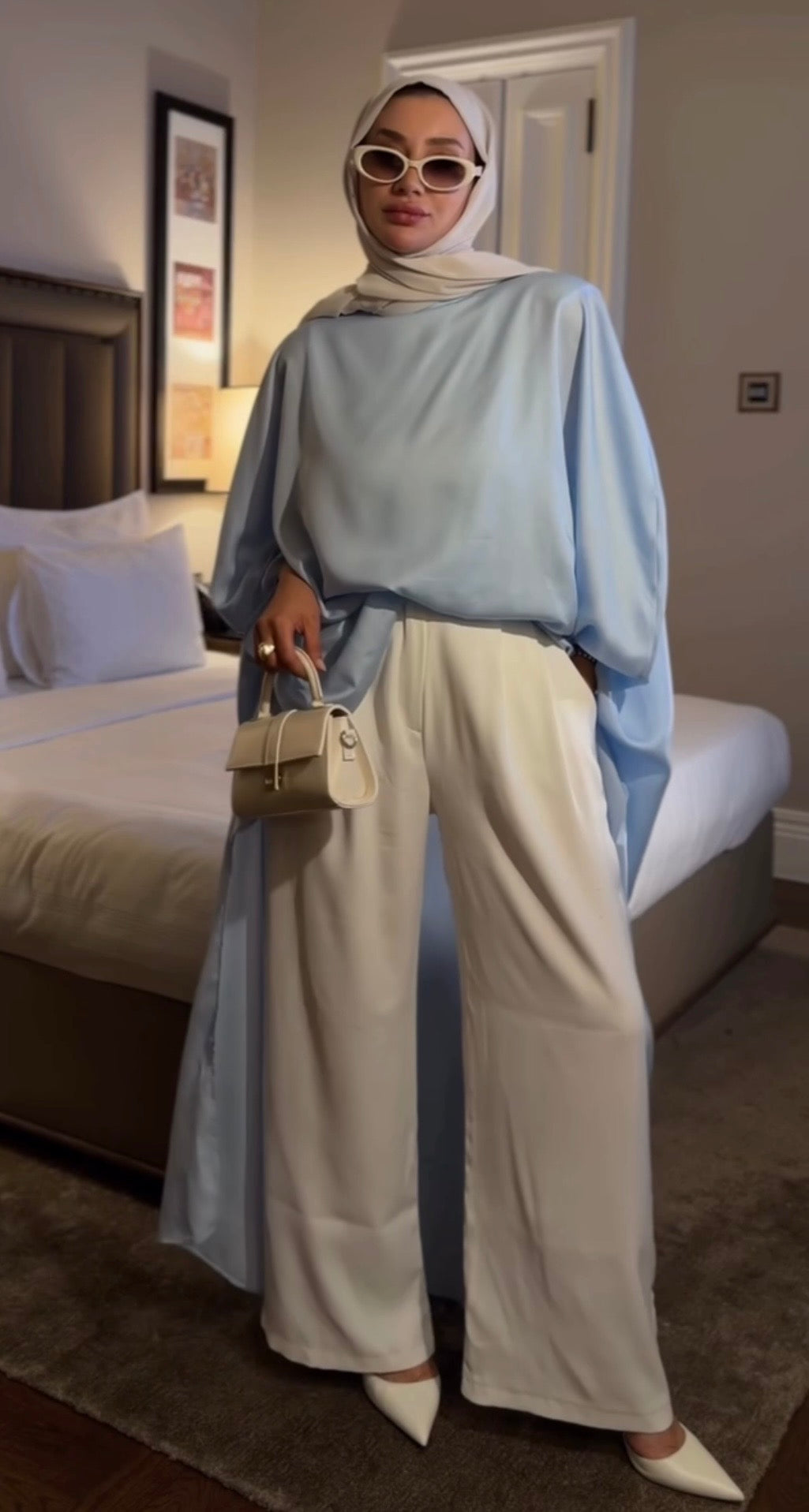 Sky Blue Satin Oversized Longline Blouse with Batwing Sleeves | بلوزة ساتان سماوية بقصة واسعة وطويلة بأكمام بات وينغ