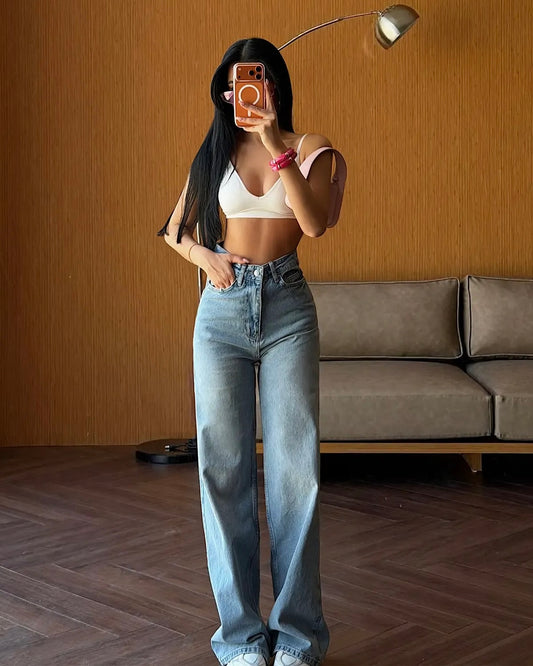 Light blue wide-leg jeans | جينز ازرق فاتح عريض