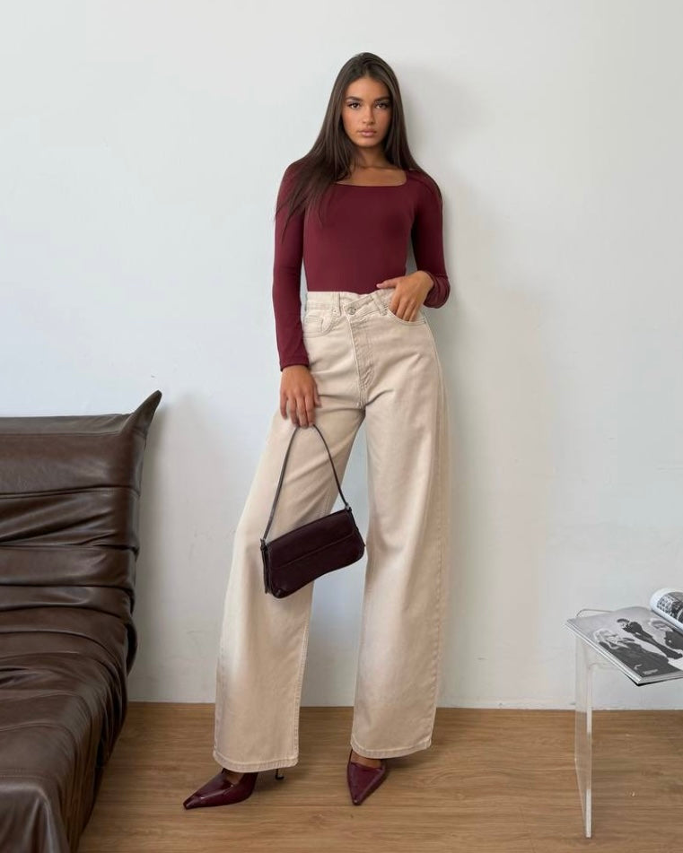 Asymmetrical Washed Black High-Rise Denim Jeans | جينز دنيم أسود كاحت بخصرٍ عالٍ بتصميم غير متماثل