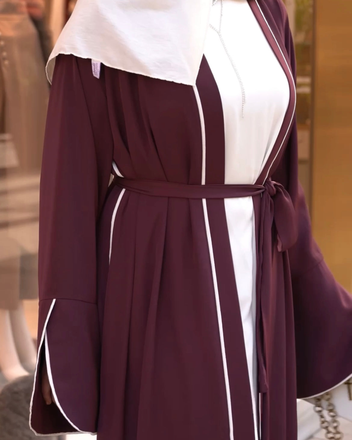 Elegant Maroon Abaya with Floral White Details | عباية أنيقة باللون الخمري مزينة بتفاصيل ورود بيضاء