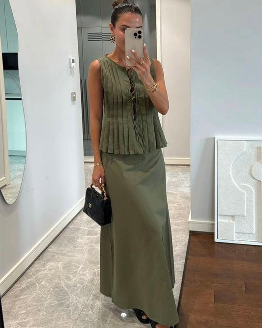 Sleeveless Olive Green Set With Pleated Top & a Flowy Skirt | طقم من توب بكسرات وتنورة واسعة وانسيابية باللون الزيتي