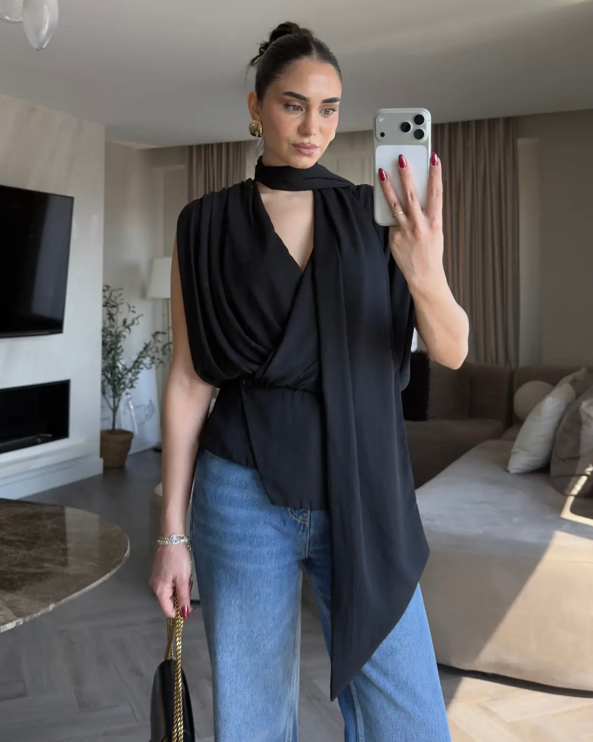 Elegant Black Draped Sleeveless Blouse with Scarf Detail | بلوزة سودة أنيقة بقصة درابيه وياقة شال