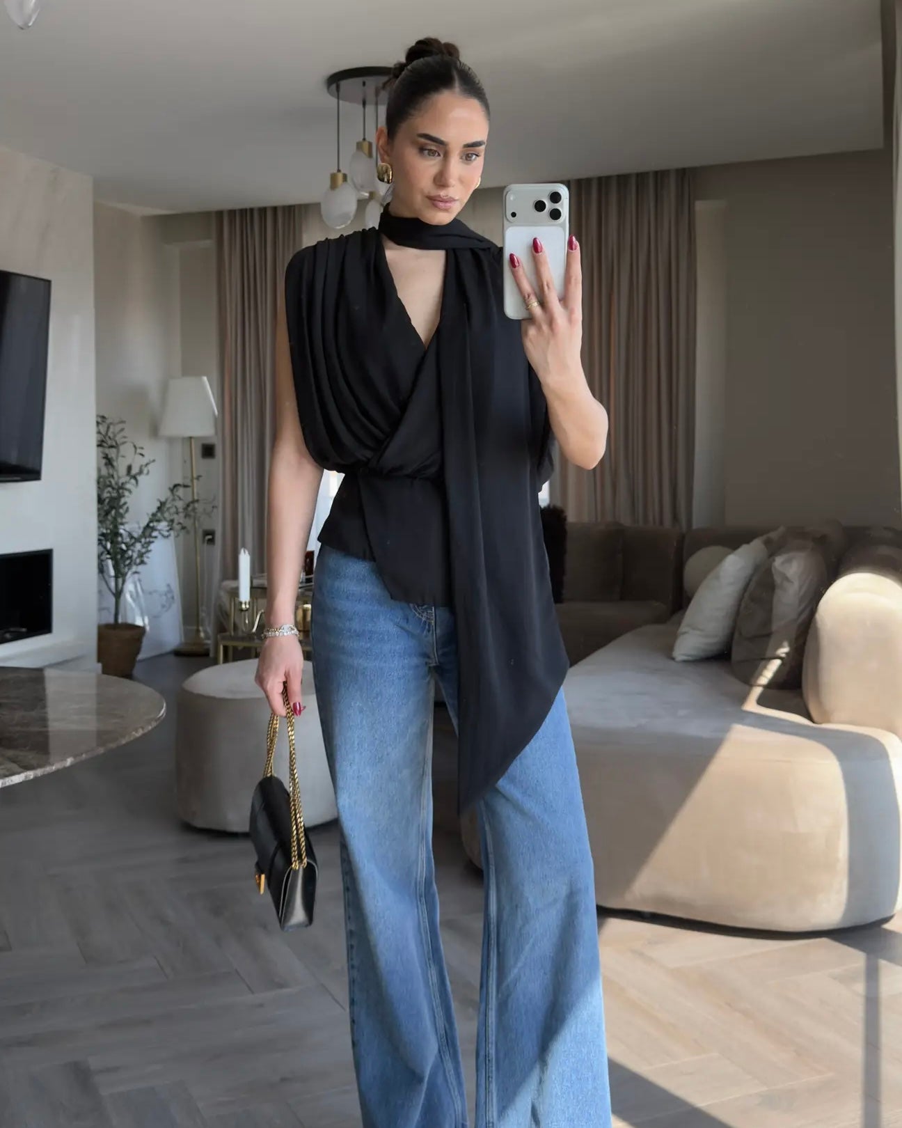 Elegant Black Draped Sleeveless Blouse with Scarf Detail | بلوزة سودة أنيقة بقصة درابيه وياقة شال