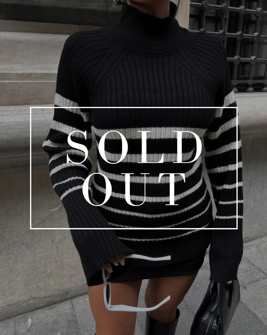 Turtleneck Sweater with Bold Striped Accents in Black