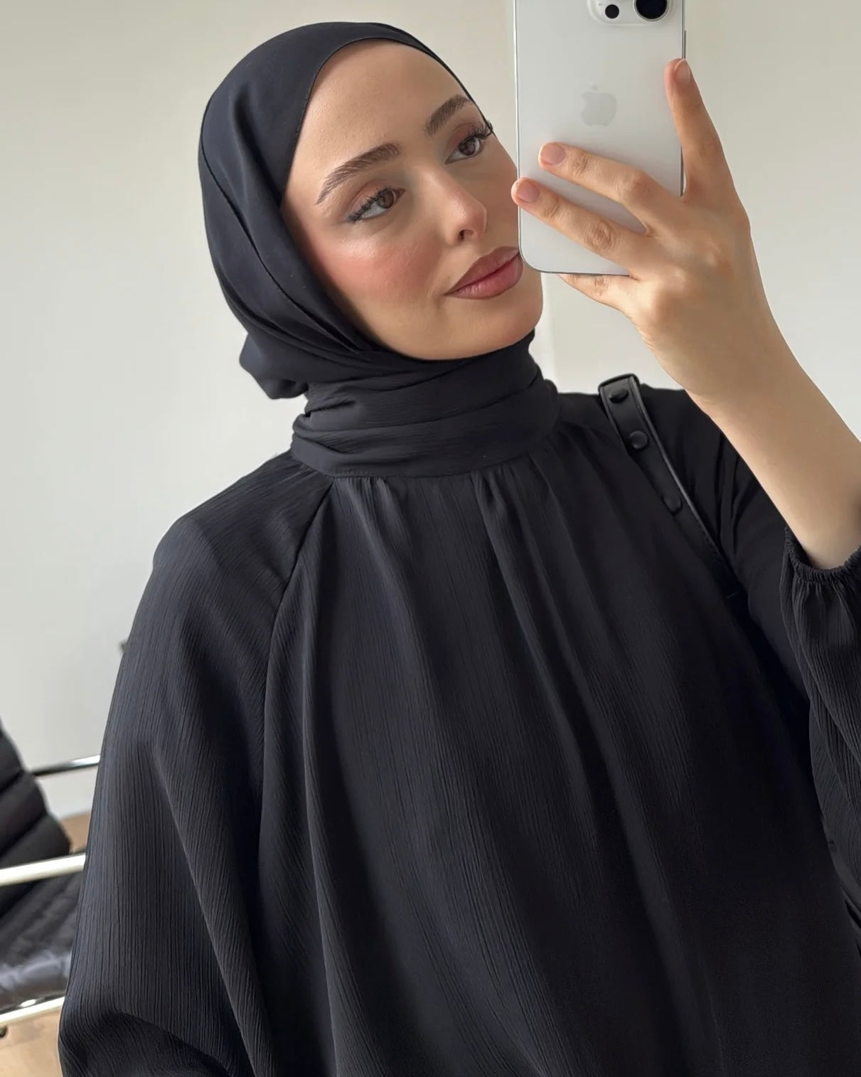 Black Blouse with High Neck and Balloon Sleeves | بلوزة أنيقة بياقة عالية وأكمام واسعة