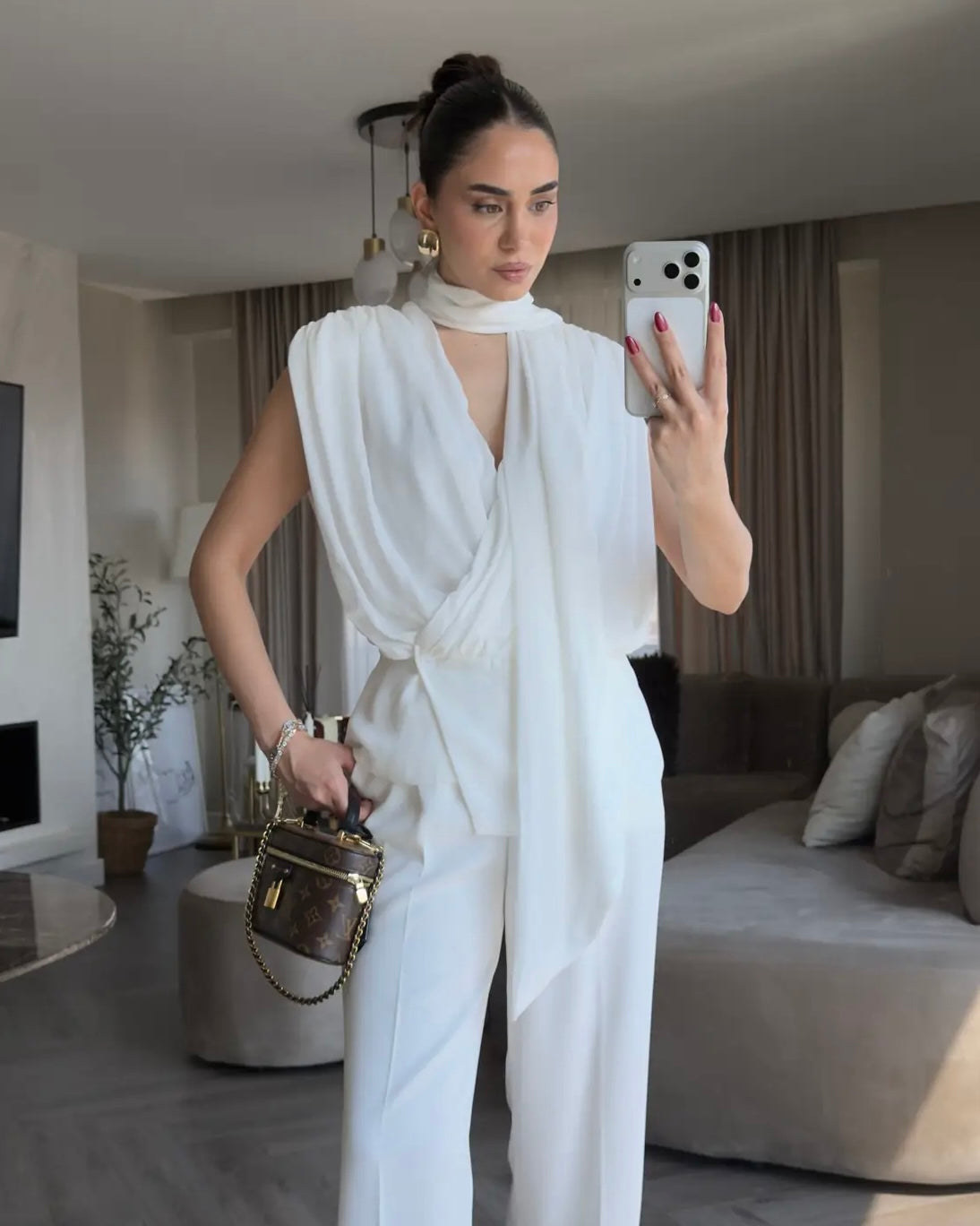 Elegant White Draped Sleeveless Blouse with Scarf Detail | بلوزة بيضا أنيقة بقصة درابيه وياقة شال