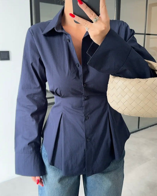 Navy Tailored Button-Down Shirt with Sculpted Waist & Wide Cuffs | بلوزة بأزرار بتصميم منحوت وأكمام واسعة باللون الكحلي