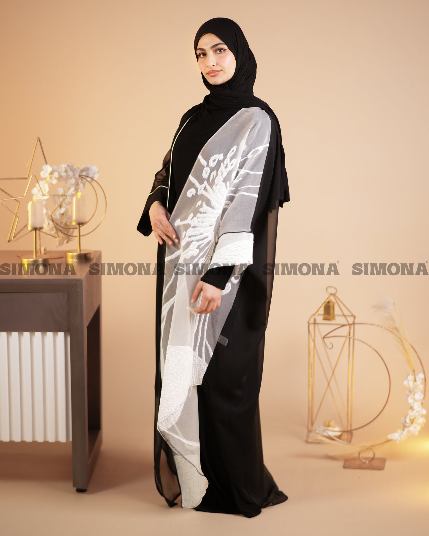 Luxurious Black Kaftan Embellished with White Embroidery