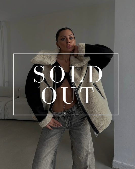 ז'קט פרווה עם שרוולי זמש