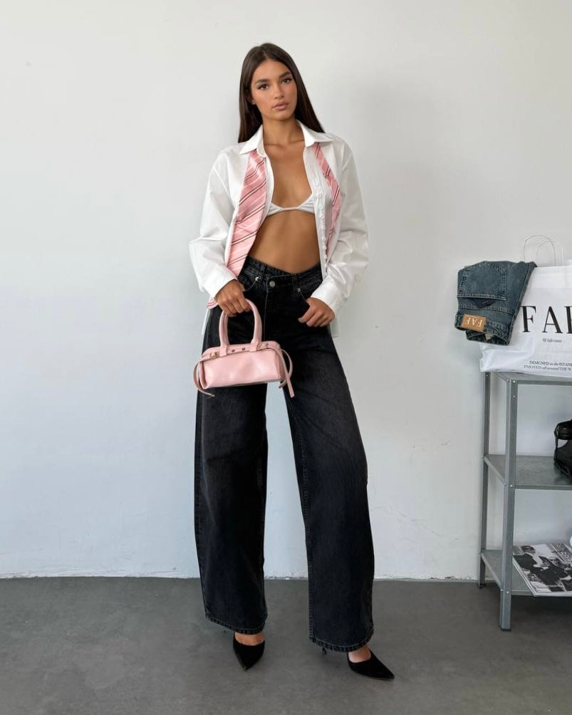 Asymmetrical Beige High-Rise Denim Jeans | جينز دنيم بيج بخصرٍ عالٍ بتصميم غير متماثل