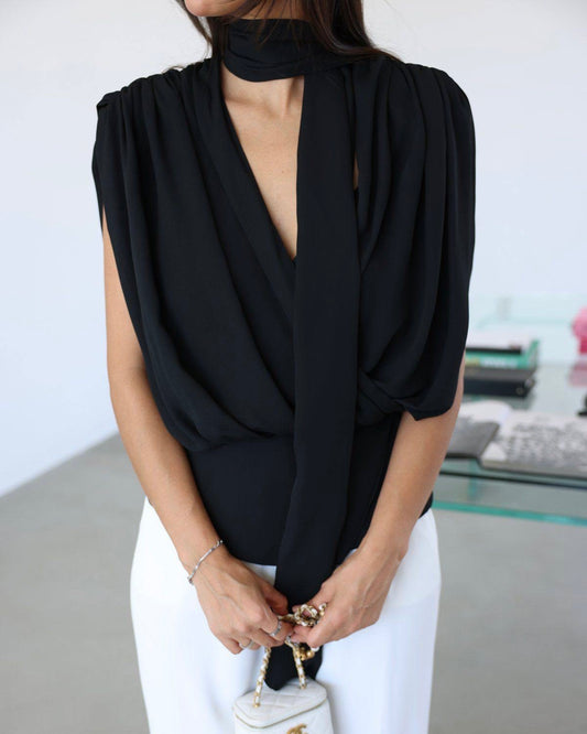 Elegant Black Draped Sleeveless Blouse with Scarf Detail | بلوزة سودة أنيقة بقصة درابيه وياقة شال