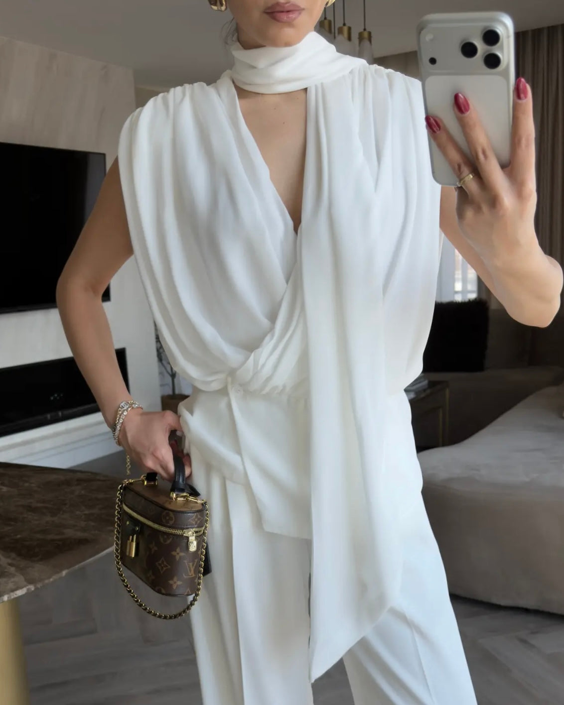 Elegant White Draped Sleeveless Blouse with Scarf Detail | بلوزة بيضا أنيقة بقصة درابيه وياقة شال