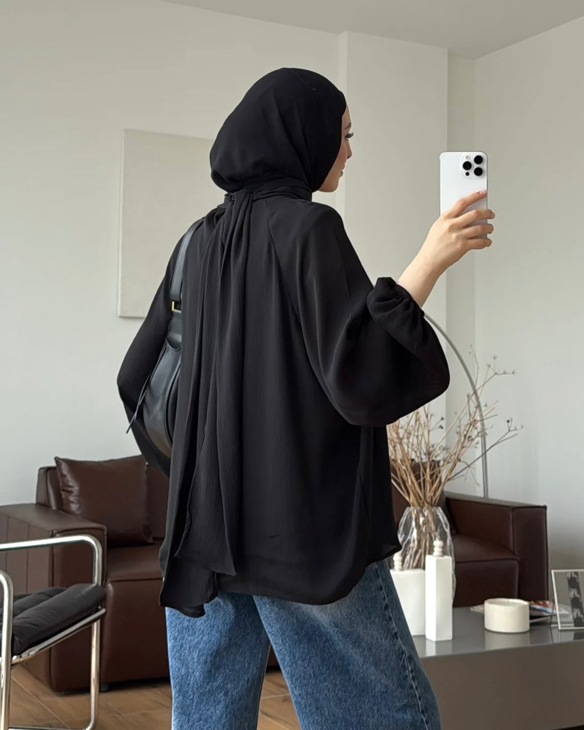 Black Blouse with High Neck and Balloon Sleeves | بلوزة أنيقة بياقة عالية وأكمام واسعة