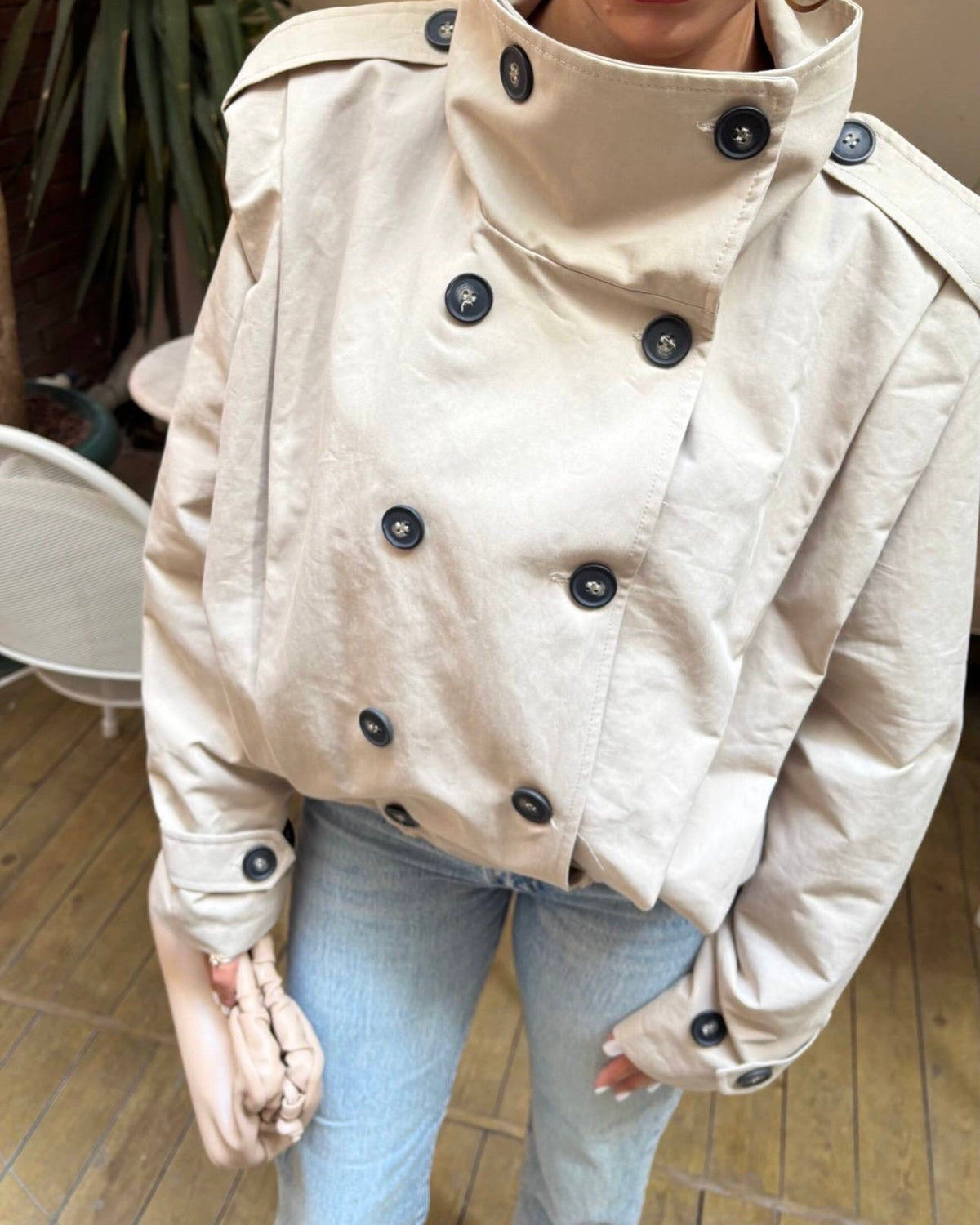 Elegant Cream Double-Breasted Trench Jacket with High Neck & Belted Cuffs | جاكيت ترانش كريمي أنيق بأزرار مزدوجة وياقة عالية وأساور بحزام