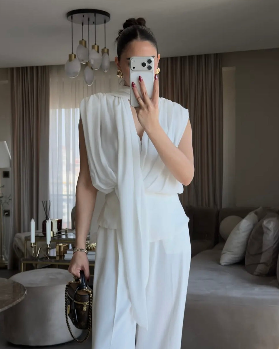 Elegant White Draped Sleeveless Blouse with Scarf Detail | بلوزة بيضا أنيقة بقصة درابيه وياقة شال