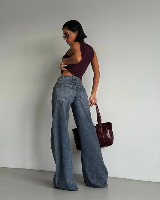 Wide-Leg Jeans in Dark Vintage Wash with Distressed Hem | جينز فينتاج واسع بلون دنيم غامق