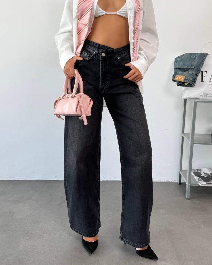 Asymmetrical Washed Black High-Rise Denim Jeans | جينز دنيم أسود كاحت بخصرٍ عالٍ بتصميم غير متماثل