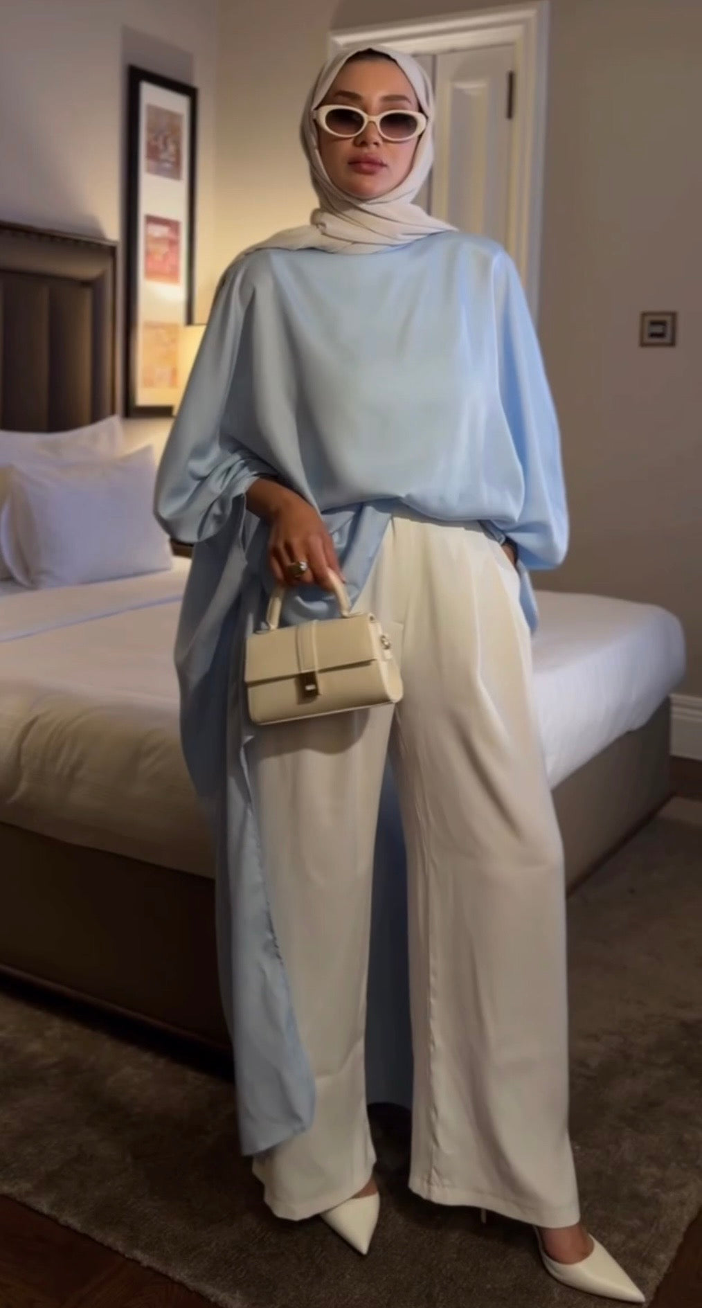Sky Blue Satin Oversized Longline Blouse with Batwing Sleeves | بلوزة ساتان سماوية بقصة واسعة وطويلة بأكمام بات وينغ