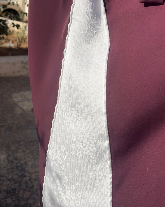 Elegant Maroon Abaya with Floral White Details | عباية أنيقة باللون الخمري مزينة بتفاصيل ورود بيضاء
