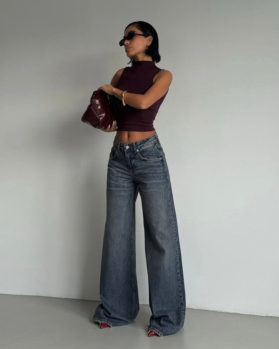 Wide-Leg Jeans in Dark Vintage Wash with Distressed Hem | جينز فينتاج واسع بلون دنيم غامق