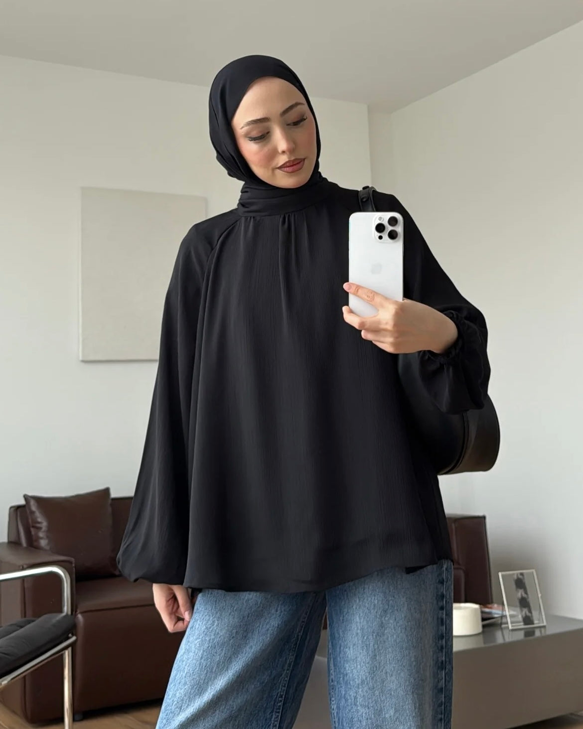Black Blouse with High Neck and Balloon Sleeves | بلوزة أنيقة بياقة عالية وأكمام واسعة