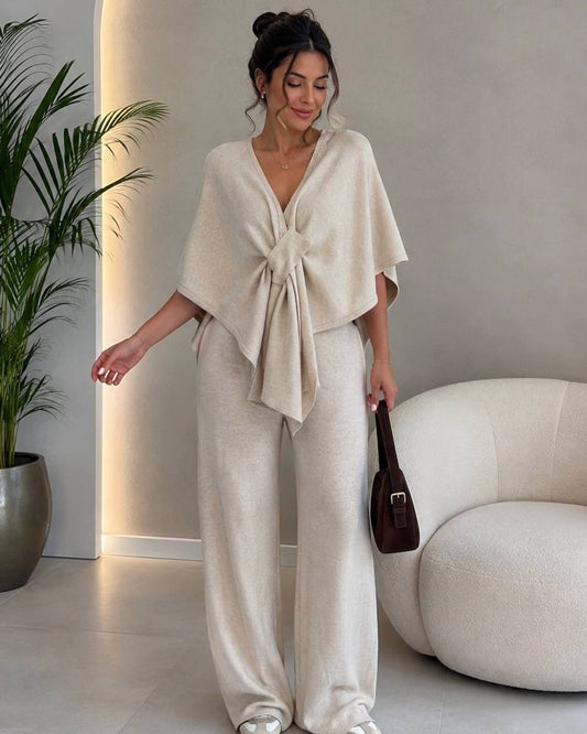 Elegant Black Knit Two-Piece Set with Tie-Front Cape Top | طقم اسود أنيق ببلوزة واسعة مع ربطة أمامية